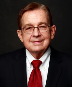 T. Milford Harrison, President